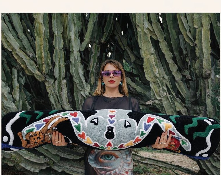 Masha with colorful rug